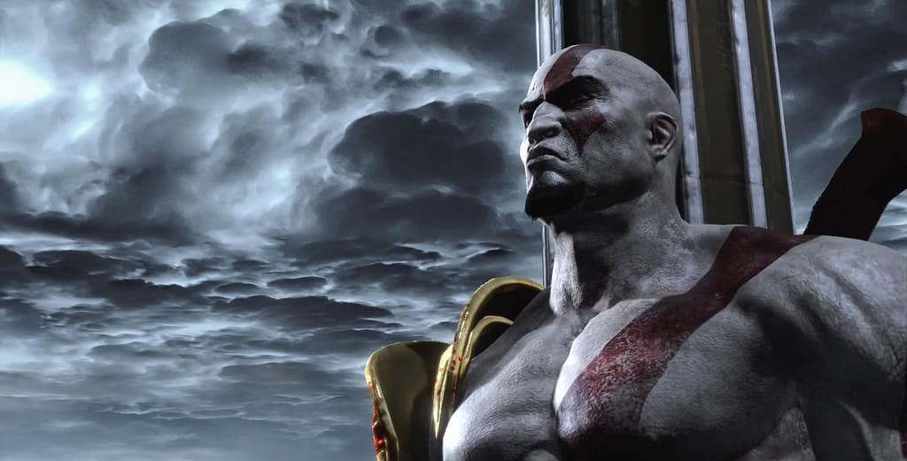 Image Descriptor: A screenshot from God of War 3 Remastered. Kratos stands, fearless and stoic, against a background of a column and a completely dark and cloudy sky.