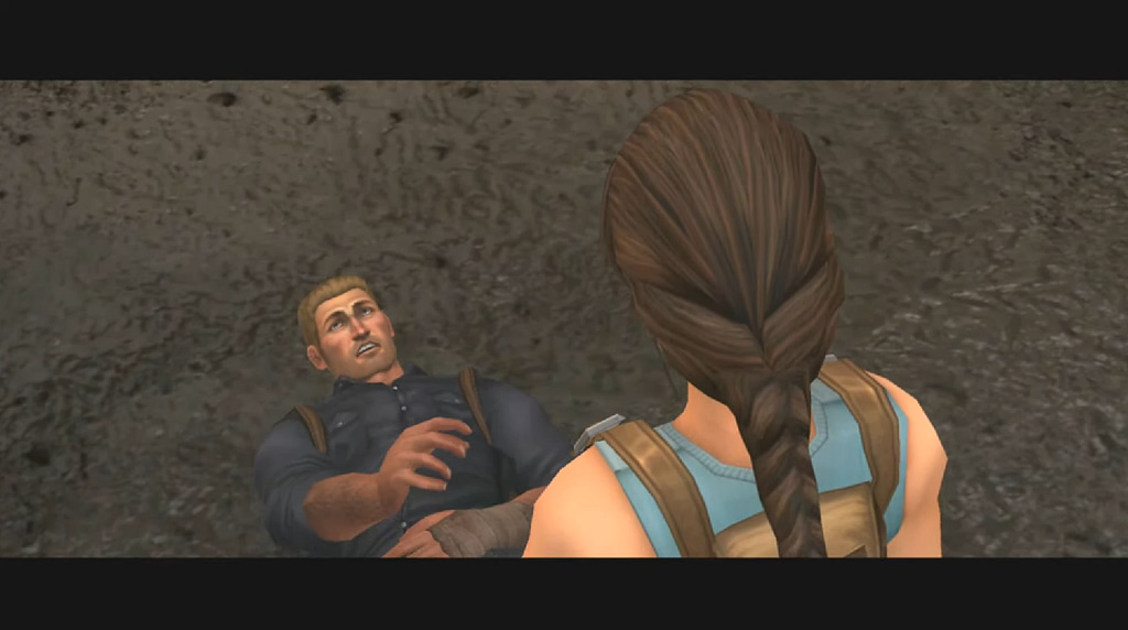 Image Descriptor: Lara stands over a dying Larson Conway, who reaches his arm towards her as his eyes roll back in his head.