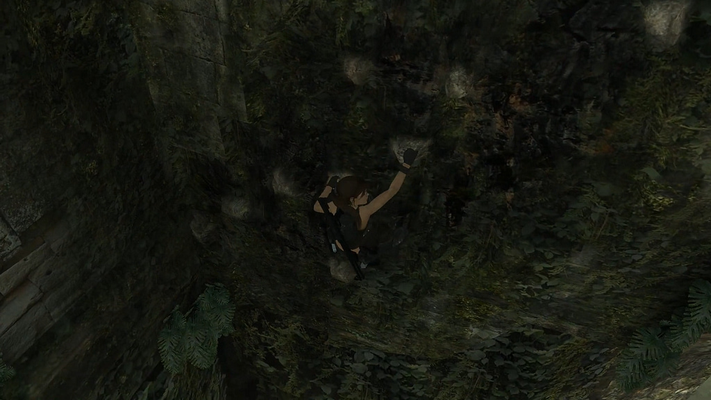 Image Descriptor: Lara climbs across a natural rock formation on a mossy and vine-coated cliff face. 